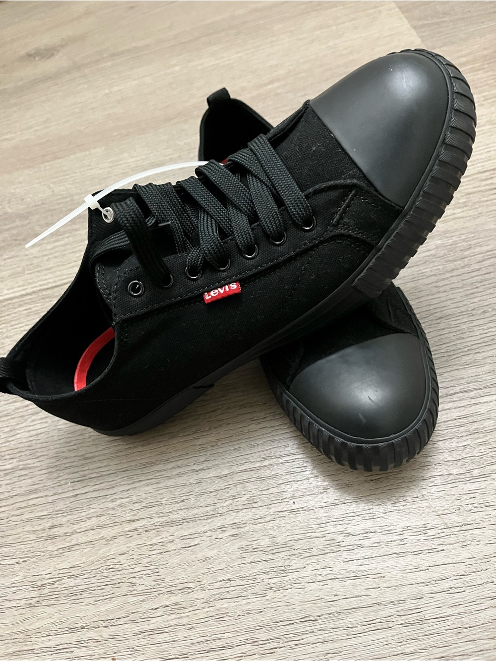 Levi's Men's Black Canvas Lace Up Low-Top Sneakers with Red Logo Accent Size 10